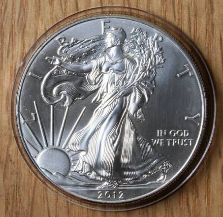 2012 Silver Eagle edge error showing irregular reeds or collar die defect close-up
